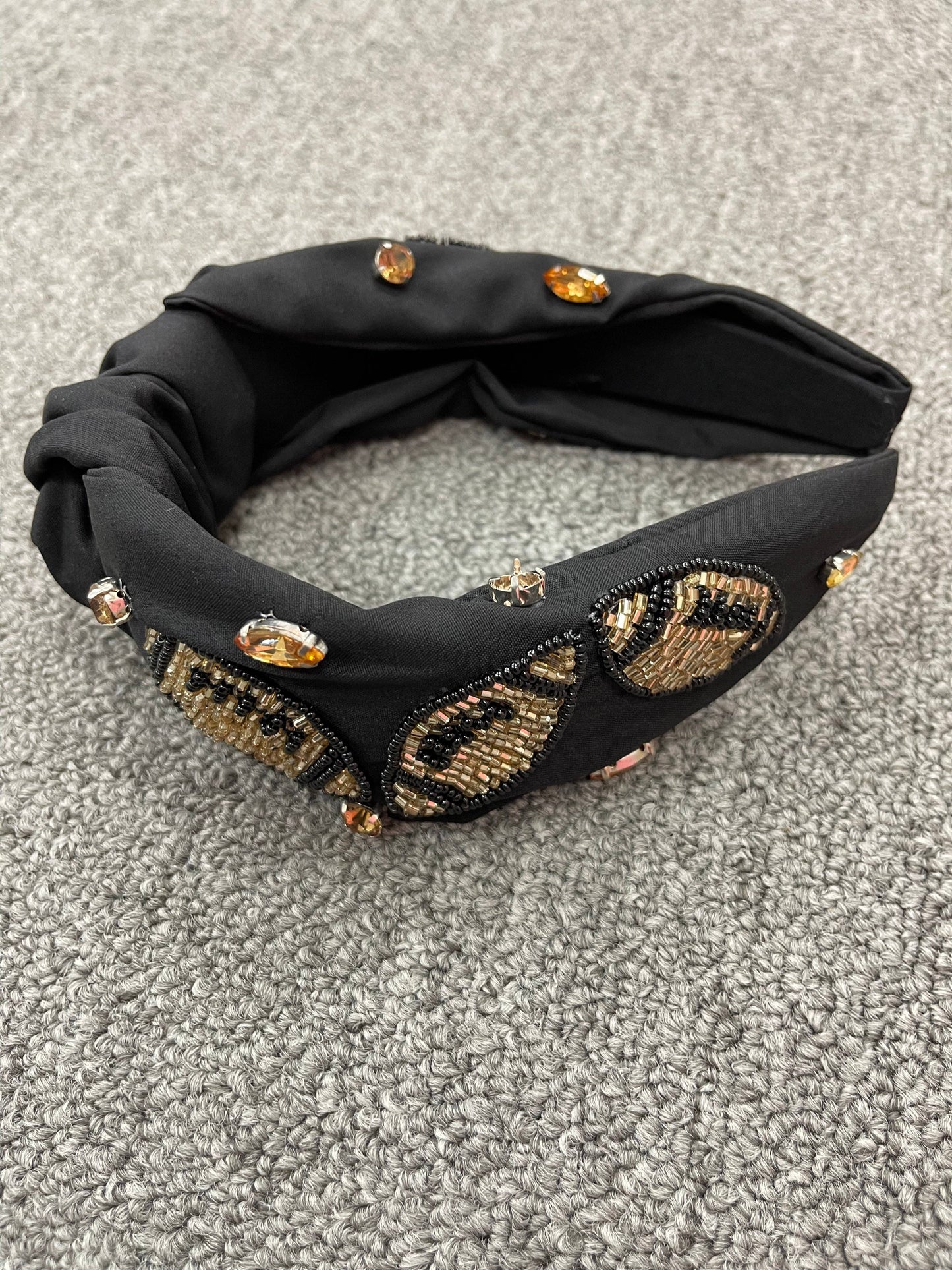 Black/gold Football headband Treasure Jewels Inc.