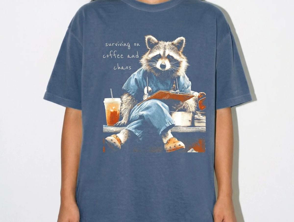 Surviving on Coffee & Chaos Raccoon Graphic brandedbybarta