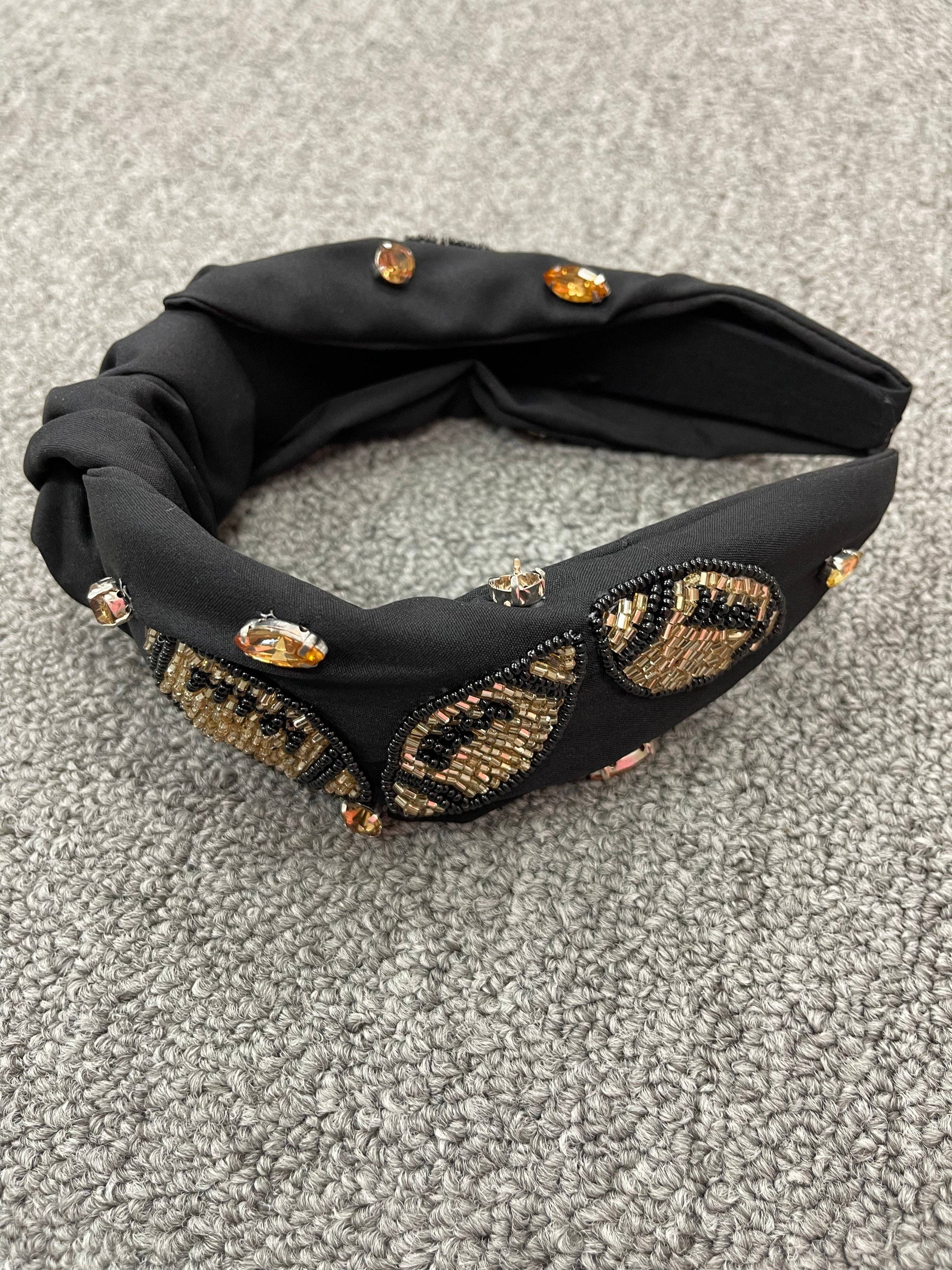 Black/gold Football headband Treasure Jewels Inc.
